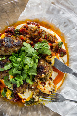 Beef meatballs with vegetables. The cuisine of Tel Aviv.