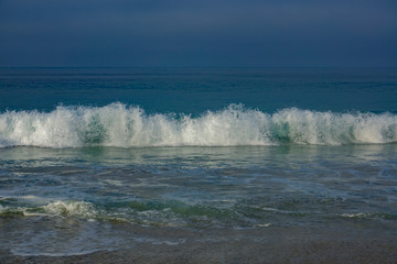Waves Crashing on the Shore in Southern California on a Cloudy Day