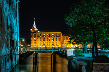 Beautiful photo of Venice at night. Light from the lanterns erupts in the canals of Venice