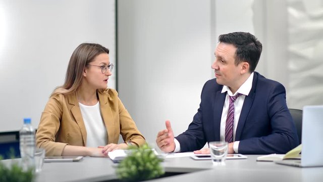 Business people in suit having meeting discussing analytics strategy at office