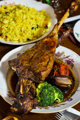 Rack of lamb with vegetables. The cuisine of Tel Aviv.