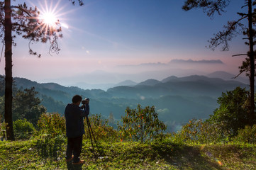 Tourists are taking pictures of the morning scenery of Doi Luang Chiang Dao from Doi Kham Fah Viewpoint, Pha Daeng National Park, Chiang Mai Province.