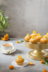 British afternoon tea party with lemon cupcakes. Bakery, patisserie, cafe menu concept. Copy space