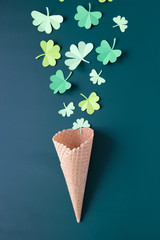 St. Patrick's day, Waffle cone with Shamrock on a green background