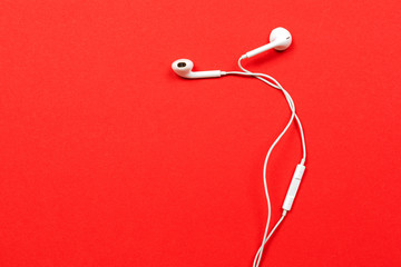 headphones isolated on red background