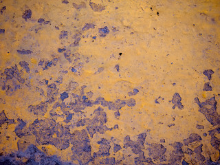 Cement floors that are yellow and black in colo