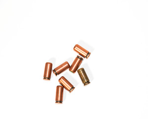 ammunition cartridges for firearms on a white background