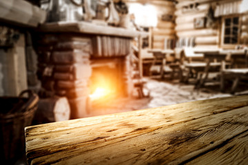 Desk of free space and home interior with fireplace 