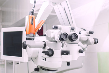 Medical ophthalmology professional equipment. Microsurgical microscope in a operating room. Ophthalmologist clinic concept 