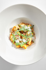 Tortellini with Perch and Tomato Sauce in Restaurant Isolated