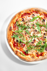 Pizza with Tuna, Olives and Arugula Top View Isolated