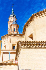 View of the apse and the top of the Baroque style bell tower of the church of Sta Maria de Ateca,...