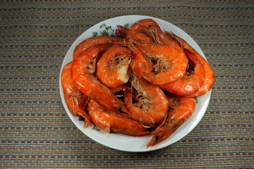 Baked shrimp or boiled prawn with shell on the plate. Famous traditional Chinese menu in Chinese New Year or ancestor ceremony. Luxury Seafood menu in restaurant.