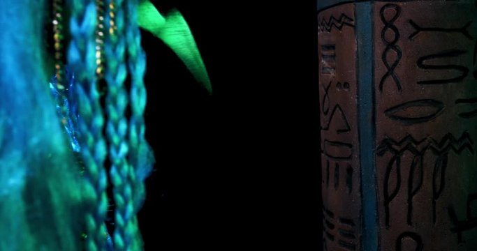 Close up of deity Thoth with the head of ibis, writing on a column, 4k