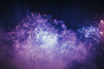 Fototapeta premium Fireworks overlay for holiday backgrounds with copy-space.