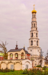 Fototapeta na wymiar The bell tower of ancient Ugresha Monastery in Moscow region