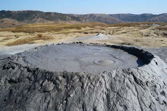 Mud volcano with lava exiting from him in national park of the mud volcanoes, Berca, Romania.