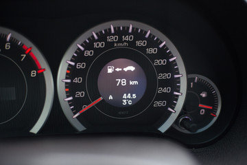 Modern car illuminated dashboard closeup