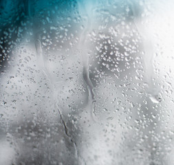 Water droplets on a gray background