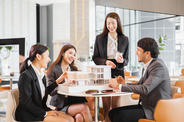 Group of young asian business people meeting in office for house real estate residence project