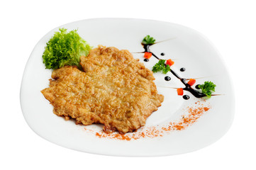 Schnitzel chop cutlet with a lettuce isolated on a white background