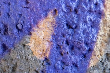 wall with rough texture and spray paint 