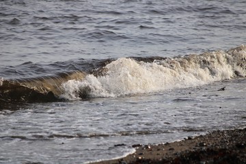 waves breaking on the shore