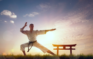 Fototapeta na wymiar Karate fighters on morning training.