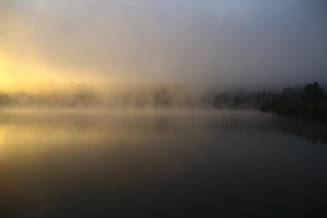 Obraz na płótnie Canvas Foggy lake in Hungarian lake.