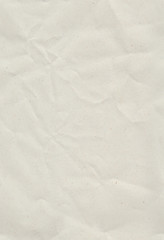 Slightly wrinkled recycled paper. Seamless pattern with a crumpled recycled paper texture and stretched again.
