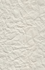 Obraz premium Very wrinkled recycled paper. Seamless pattern with a crumpled recycled paper texture and stretched again.