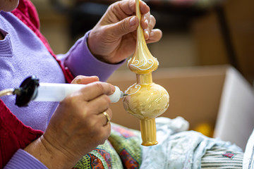 Obraz premium Small production of handmade Christmas toys