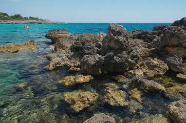 Fototapeta na wymiar Rocks at Porto Pirrone bay - Taranto, Italy