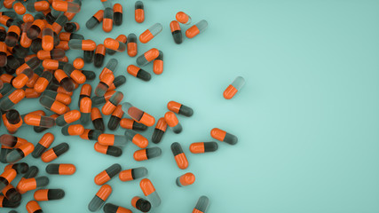 Pile of orange capsules of pills on a teal background top view. Medicine Health Pharmacy Pharmacology Concept