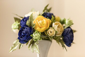 Bouquet of beautiful silk (Gallica) roses in a vase