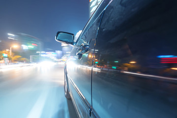 Obraz na płótnie Canvas car on the road with motion blur background