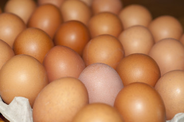 Cardboard  fresh eggs package. Selective focus.