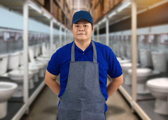 Portrait of male staff warehouse operator