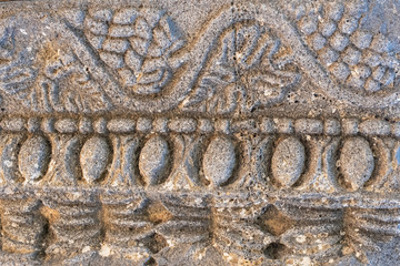 Horizontal ornament on an ancient stone