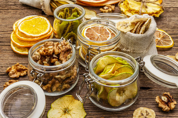 Zero waste food shopping concept. Assortment of dried fruits, walnuts. Sustainable lifestyle