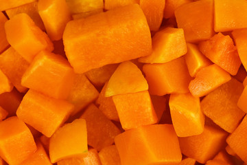 Cube shaped pices of raw red kuri squash