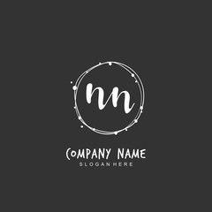 Handwritten initial letter N NN for identity and logo. Vector logo template with handwriting and signature style.