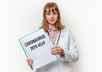 Doctor showing clipboard with written text: Coronavirus