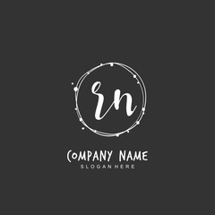 Handwritten initial letter R N RN for identity and logo. Vector logo template with handwriting and signature style.