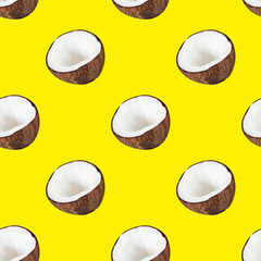 Seamless coconut pattern – halves of coco on yellow background. Creative minimal food texture. Tropical fruit and summer concept for design or print