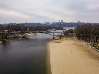 Aerial drone view. The bridge across the bay on the island of Hydropark in Kiev.