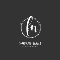 Handwritten initial letter F N FN for identity and logo. Vector logo template with handwriting and signature style.