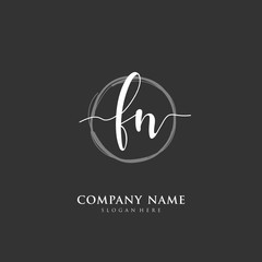 Fototapeta premium Handwritten initial letter F N FN for identity and logo. Vector logo template with handwriting and signature style.