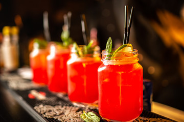 Close-up cocktails in bar.