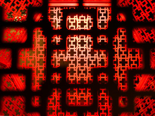 Ancient Chinese traditional tracery geometric engrave oriental design red partition in East Asian elegance pattern style for luxury palace festival event textured background interior ornament room